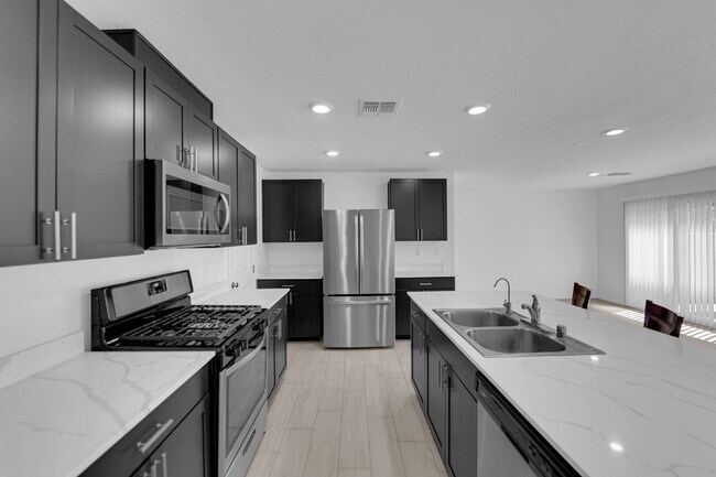 Building Photo - Don't miss out on this beautiful three-bed...
