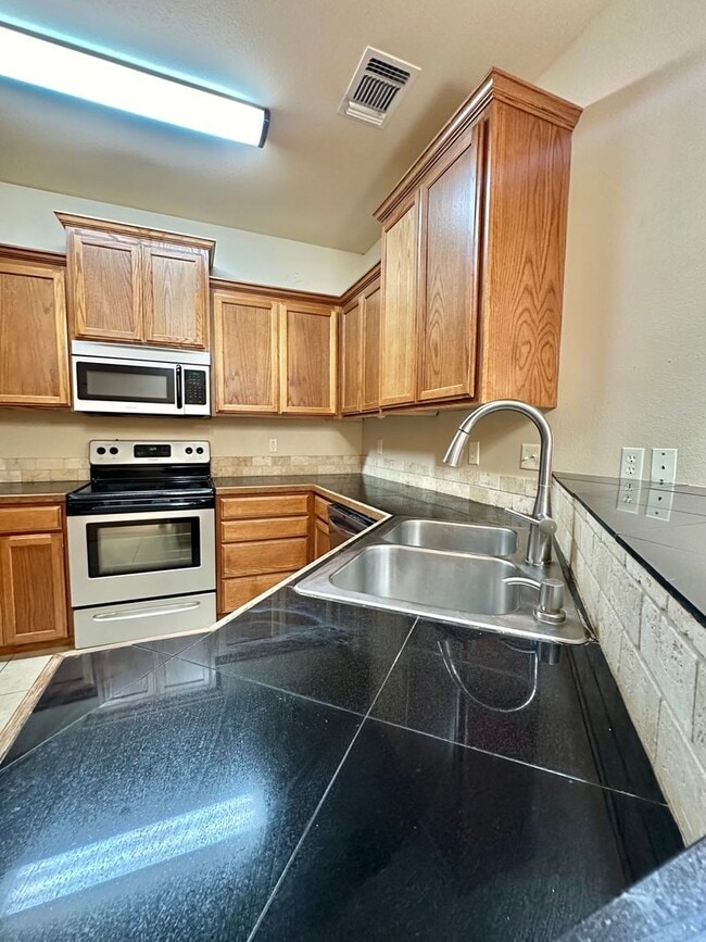 Building Photo - Now Available - Charming 3 Bedroom Patio Home