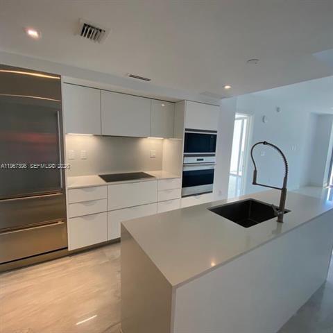 Building Photo - 9521 E Bay Harbor Dr