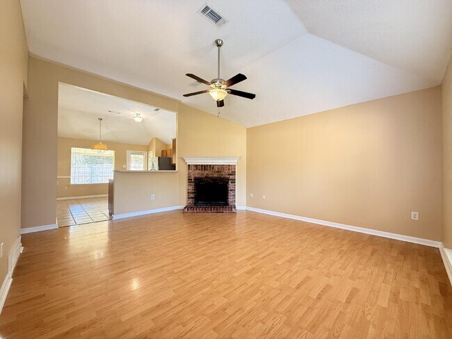 Building Photo - "Charming 3-Bedroom Lakeland Home with Cozy Fireplace & Gleaming Hardwood Floors!"