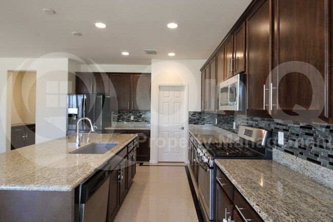 Building Photo - 10169 W Los Gatos Dr