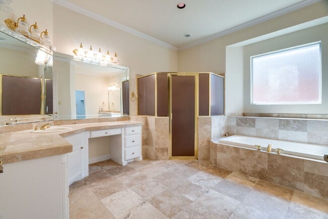 Building Photo - "Stately Gated 5-Bedroom Estate With Pool, Custom Details & Abundant Living Space!"