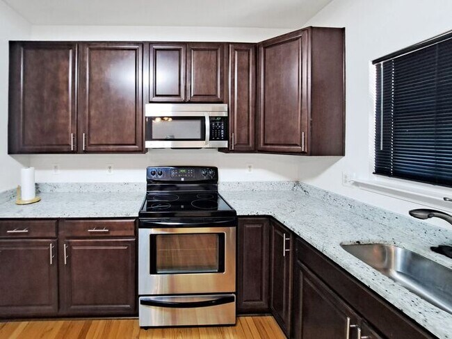 Building Photo - Charming 3-Level Brick Townhome in Waldorf...