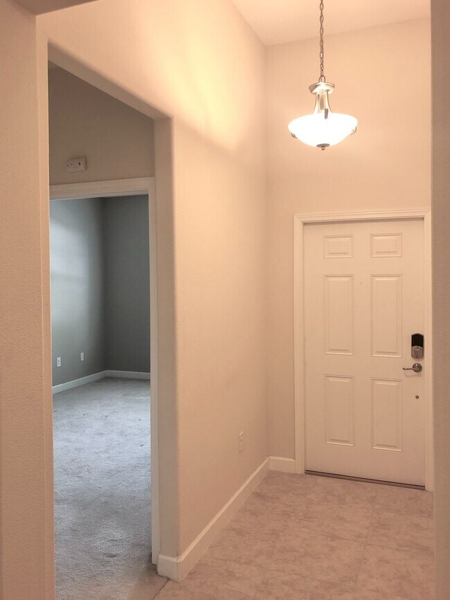 Building Photo - Beautiful 3/2 Spacious Home with a Covered...