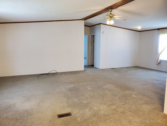 Building Photo - Charm & Commuter Convenience – 3BR/2BA Outside City Limits