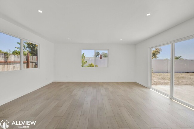 Building Photo - Fully Renovated 4-Bedroom Home with Firepl...
