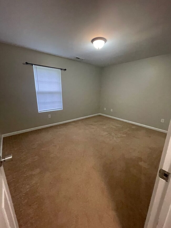 Building Photo - This two-story, 4-bedroom, 2-bath duplex in Fort Mill, SC sits on a corner lot