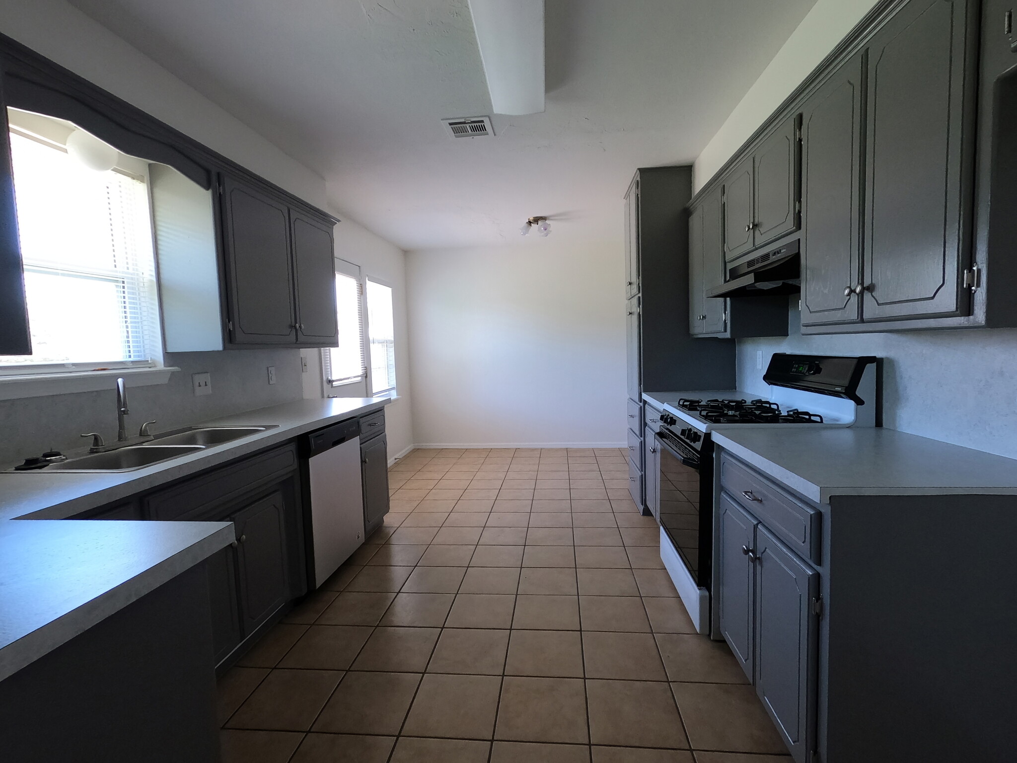 Kitchen/dining room view from utility room - 415 W Guthrie St