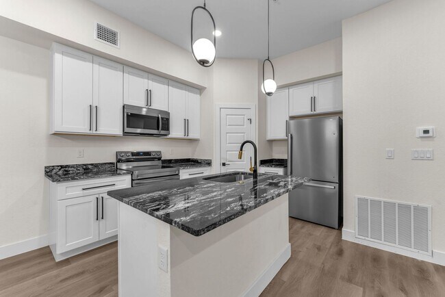 Building Photo - All Units Are Available With Brandnew Full Appliance Package