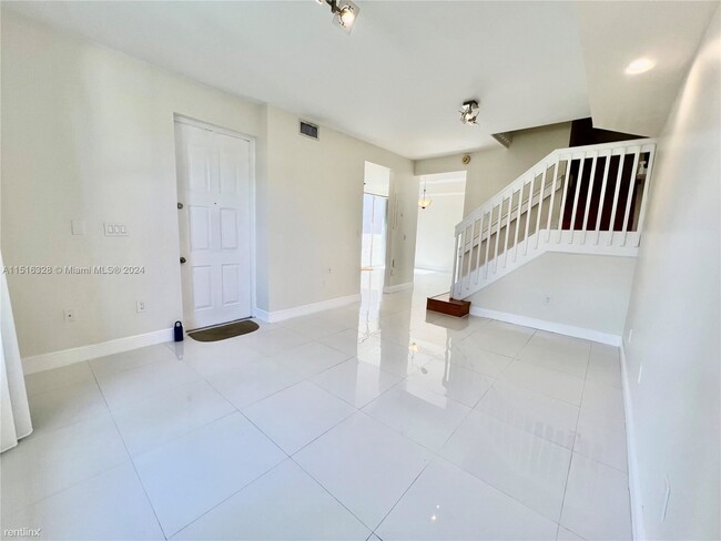 Building Photo - 3 br, 2.5 bath Condo - 8625 SW 152nd Ave A...