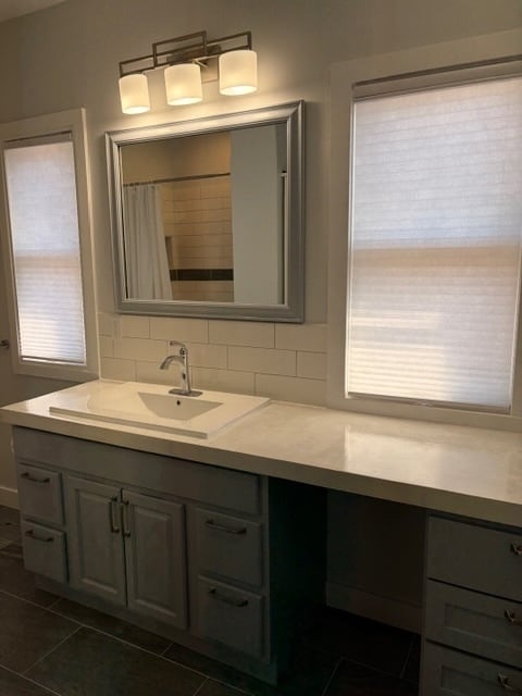 Loads of counter space and natural light in the bathroom. - 623 Pierce St NE