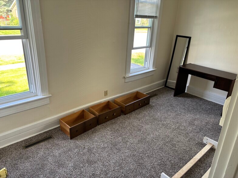 Large bedroom downstairs. - 319 Garfield Ave