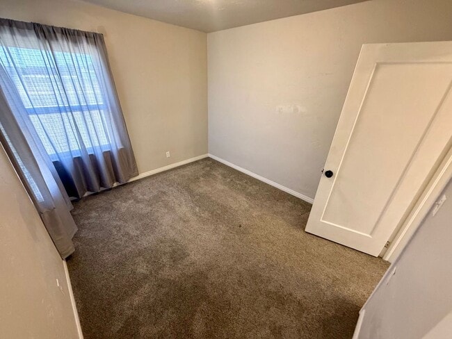Building Photo - Charming 2-Bedroom Home with Patio, Storage & Plenty of Parking