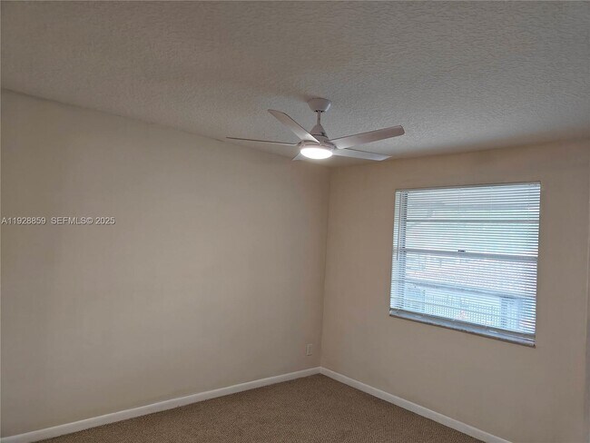 Building Photo - 8770 Royal Palm Blvd