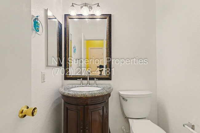 Building Photo - NW!! 4 Bedrooms!!! All Tile and Pergo flooring T/O!! NO Carpet!!! Low Maintenance Desert landscap...