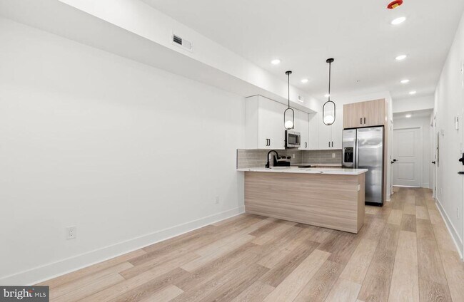 Building Photo - 5034 Florence Ave