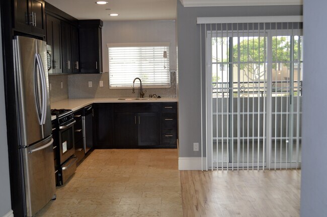 Building Photo - MOVE IN READY 2/2 with 2 Assigned Parking!...