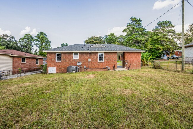 Building Photo - Charming 3-Bedroom Brick Home – Comfort, S...