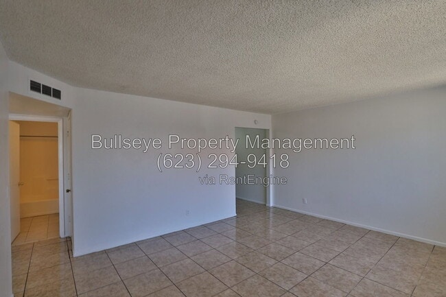Building Photo - 859 W Ray Rd