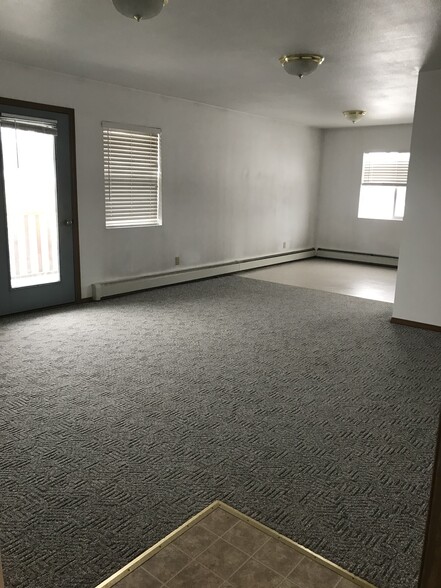 Living room looking toward the deck - 161 E Susitna Ave