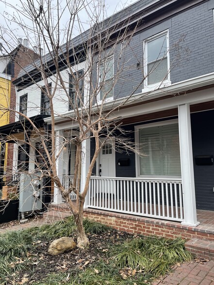 Front of house with large brick covered deck -- about 3 blocks from Whole Foods and 14th Street and 2 blocks from 9th Street - 1003 P St NW