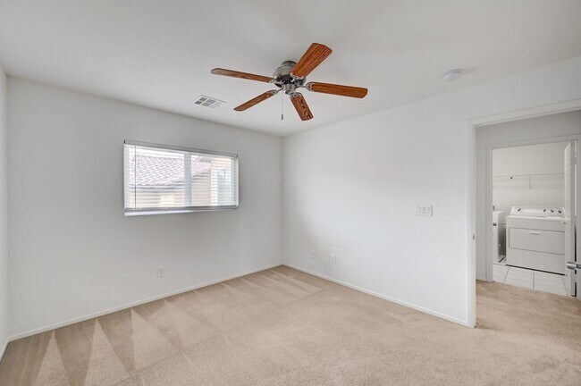 Building Photo - Beautiful 3 bedroom/2.5 baths located acro...