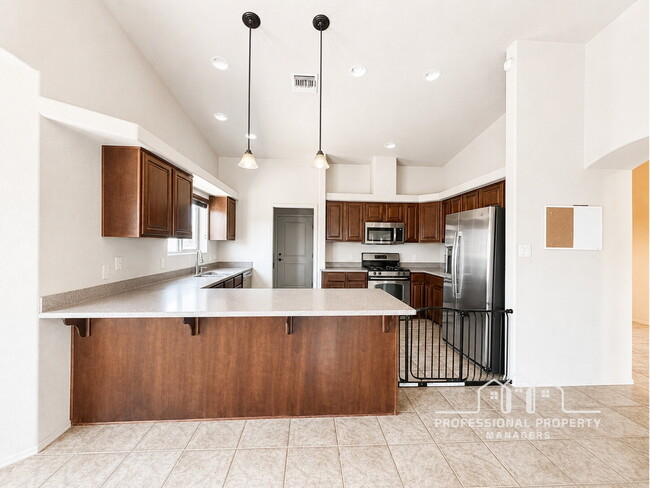Building Photo - "Spacious 4-Bedroom, 2-Bathroom SOLAR Home in Mesa del Sol!"