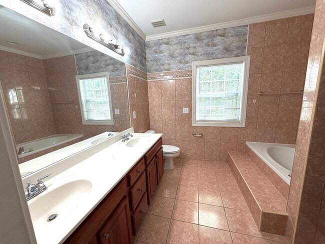 Building Photo - Beautiful Single-Family Home with Finished Basement & Fenced Backyard