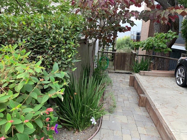 Side walkway in front of building - 6415 Snake Rd