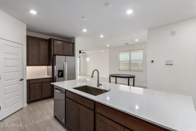 Building Photo - 6777 W Molly Ln