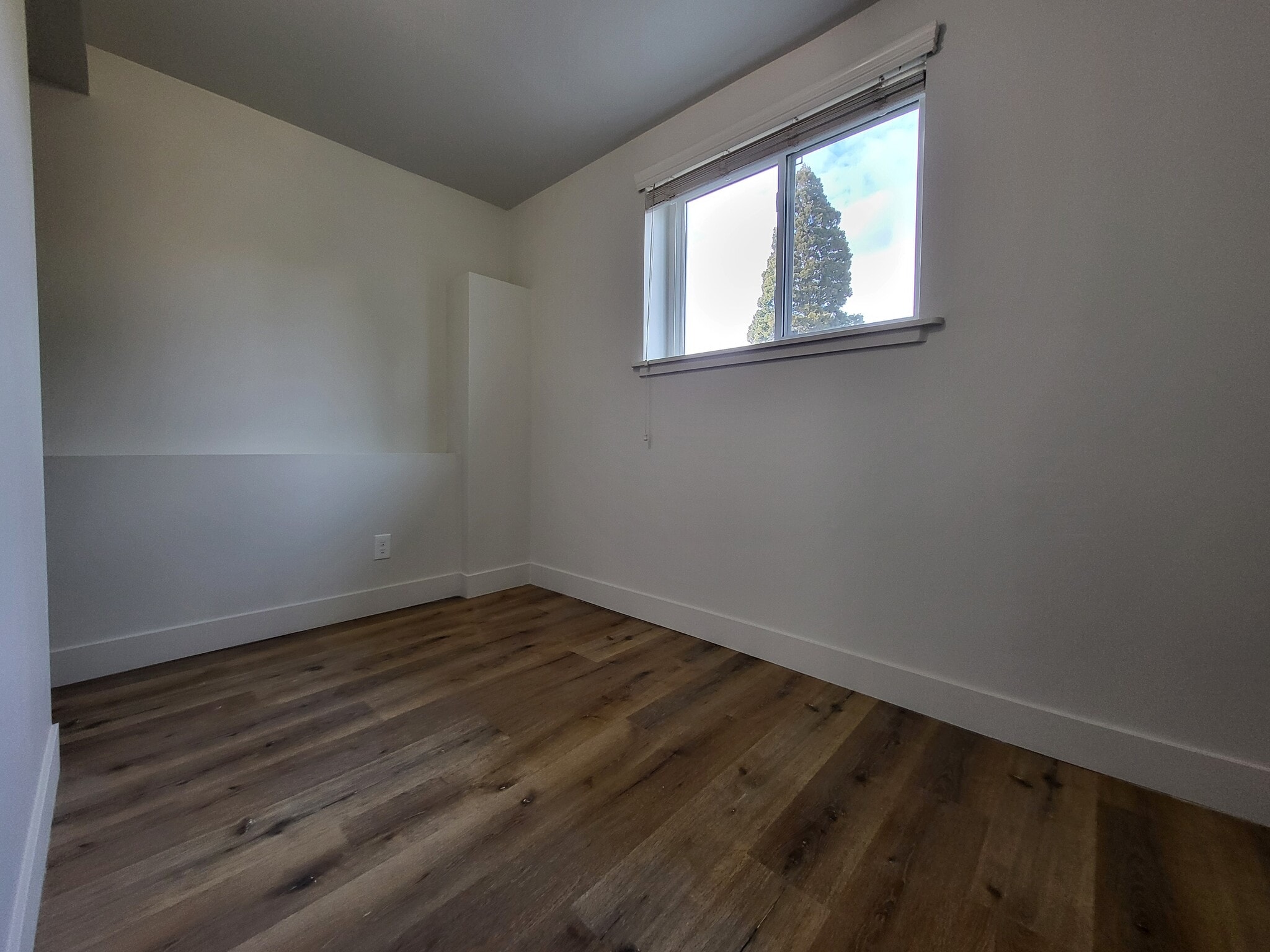 basement bedroom facing the frontyard (the window is above the ground level) - 3224 S Verdant Cir