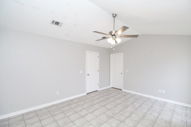 Building Photo - West Pensacola Brick Home with Vaulted Ceilings, Split Floor Plan, Open Living Design & Easy Acce...