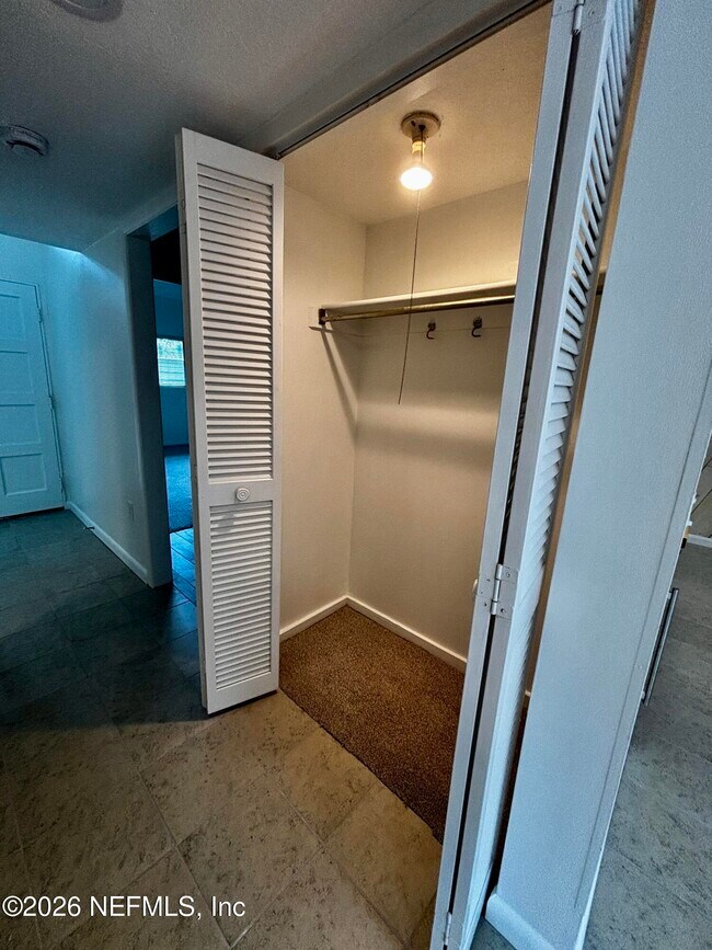 Building Photo - 9787 Sawgrass Dr E