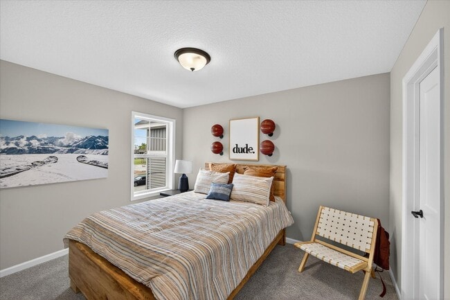 Building Photo - Westview townhome plan in Corcoran’s Hope Meadows community—a brand-new townhome development near...