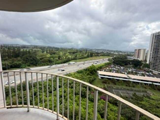 Building Photo - Welcome to your new home at Pearlridge Gardens & Tower! This 1-bedroom, 1-bathroom condo $2,100