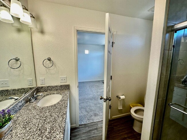 Building Photo - "Charming and spacious 3-Bed Sanctuary with 2.5 Baths the Reunion Community in Commerce City!"