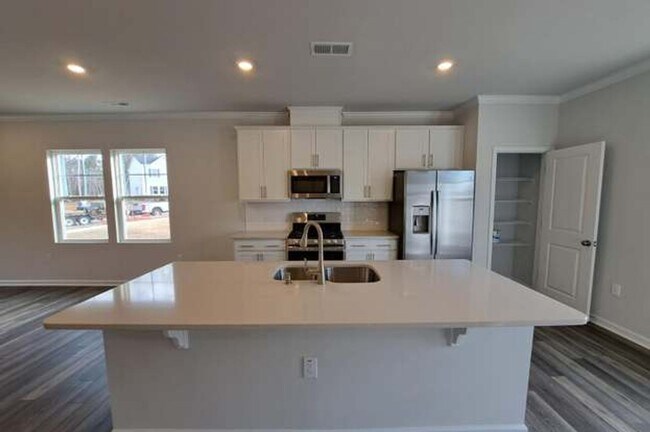 Building Photo - 3 BR/2.5BA | Newly Renovated Townhome End Unit | Private Patio| In Raleigh!