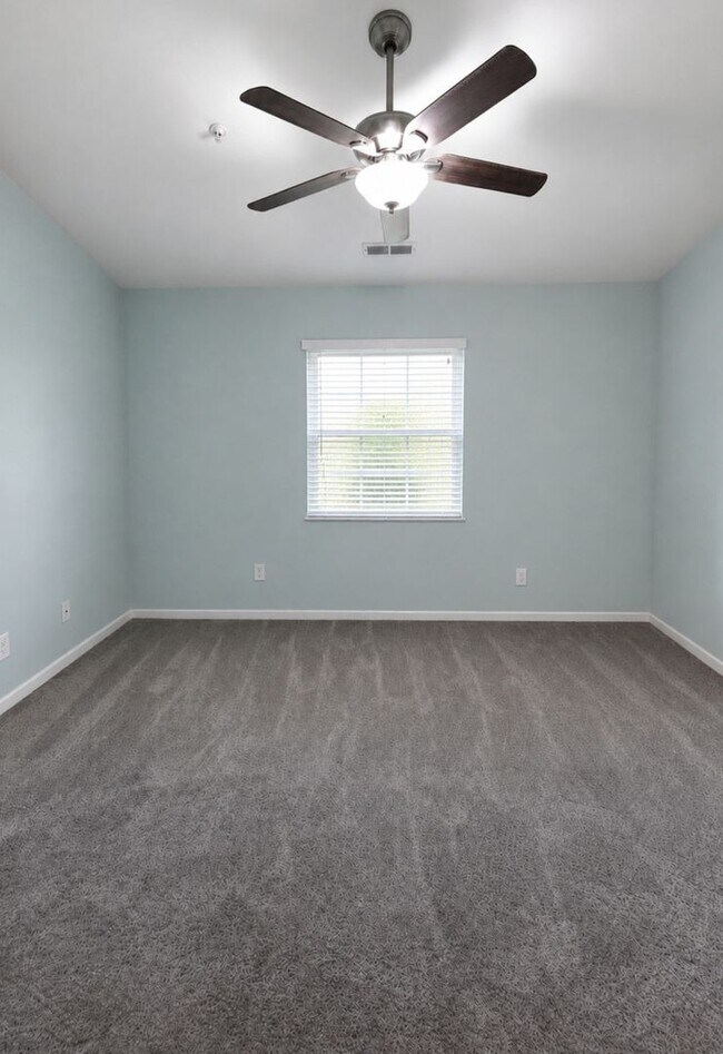 Building Photo - Spacious 2-Bedroom End-Unit Condo Near Surfside Beach
