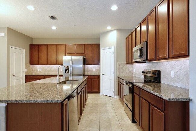 Building Photo - Gorgeous 3/2.5 Modern Townhome with 1 Car ...