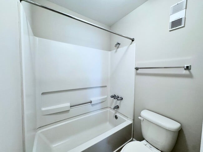 Building Photo - Updated 1st Floor/1-Level Condo Available NOW & Rent Includes Water, Sewer, Trash, Landscaping, F...