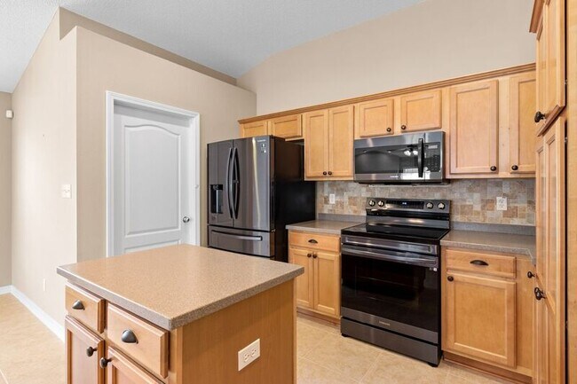 Building Photo - 5659 Tiger Woods Dr