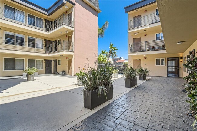 Building Photo - MOVE IN SPECIAL- Live in the Heart of Nort...