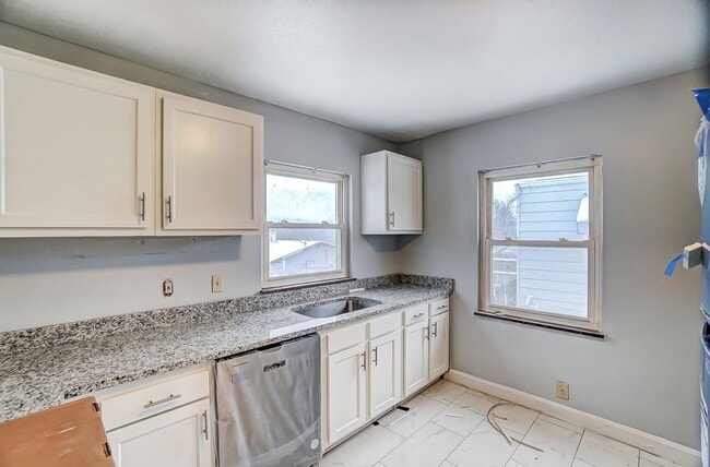 Building Photo - Four Bedroom Available!