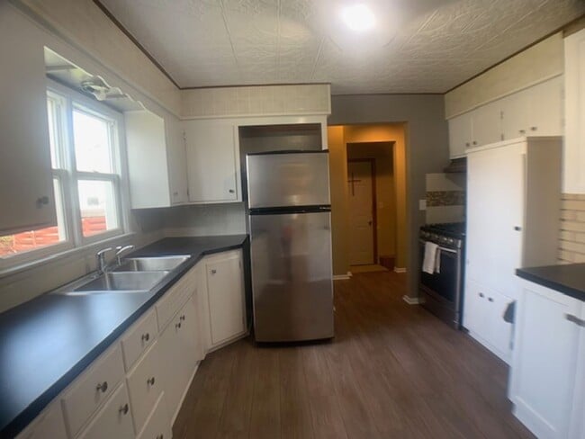 Building Photo - Huge yard! Updated appliances and more!