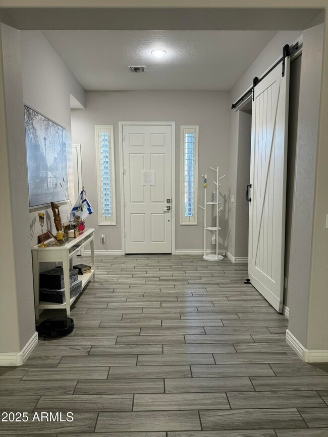 Building Photo - 17591 W Dahlia Dr