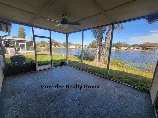 Building Photo - Relax by the water in this spacious 2-bedroom home with a 2-car garage, nestled in the highly des...