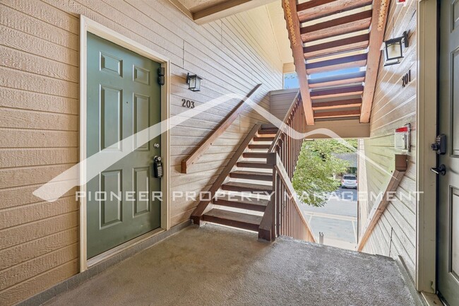 Building Photo - Spacious Condo with Central AC, Covered Parking, and Washer/Dryer