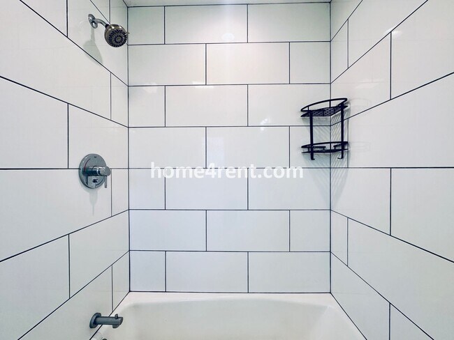 Building Photo - Charming Home Near Country Club Plaza w/ Gorgeous Updates, Wood Floors and a Two Car Garage!