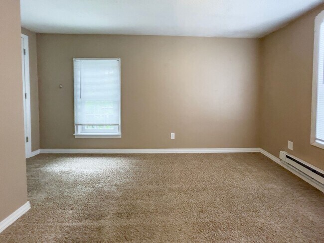 Building Photo - PRELEASING for AUGUST! Walk to Ball State! Bright 4BR Home with Fireplace