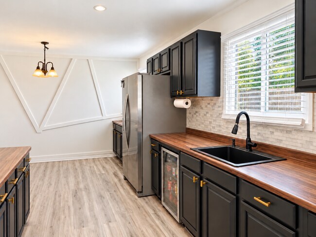 Building Photo - Your Day Demands Everything. Home Should Give Something Back.